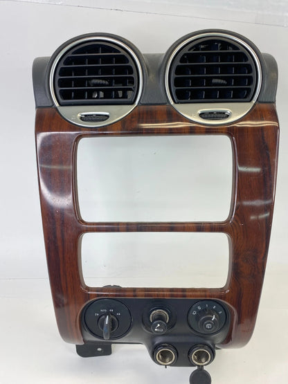 2002-2006 GMC ENVOY XL 02-09 ENVOY DASH RADIO BEZEL TRIM W/ AIR VENT & SWITCHES