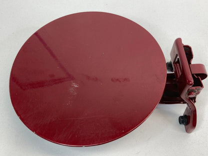 2007-2010 KIA SEDONA BASE FUEL FILLER DOOR GAS LID COVER 7P CHERRY KISS OEM