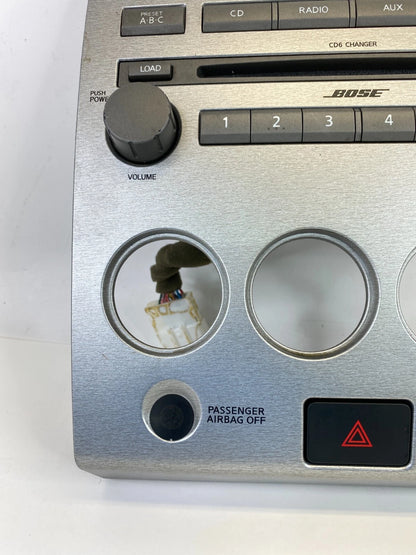 05 06 NISSAN ARMADA CD RADIO PLAYER RECEIVER CLIMATE HEATER CONTROL BEZEL PANEL
