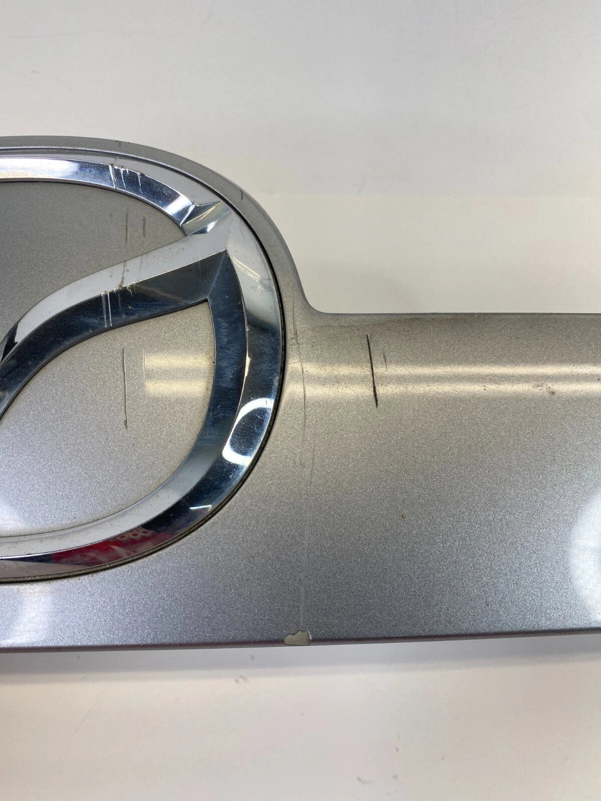 10-12 MAZDA CX-7 LIFTGATE TAILGATE TRUNK LID LICENSE LIGHT PLATE FINISH MOLDING