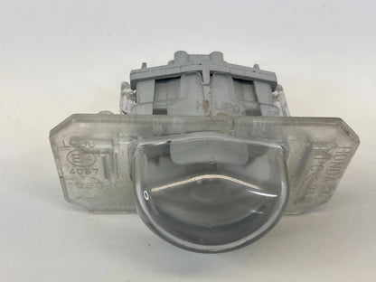 2001-2011 HONDA CIVIC REAR LICENSE PLATE LIGHT LAMP W/ LENS E4-4057-1080 OEM