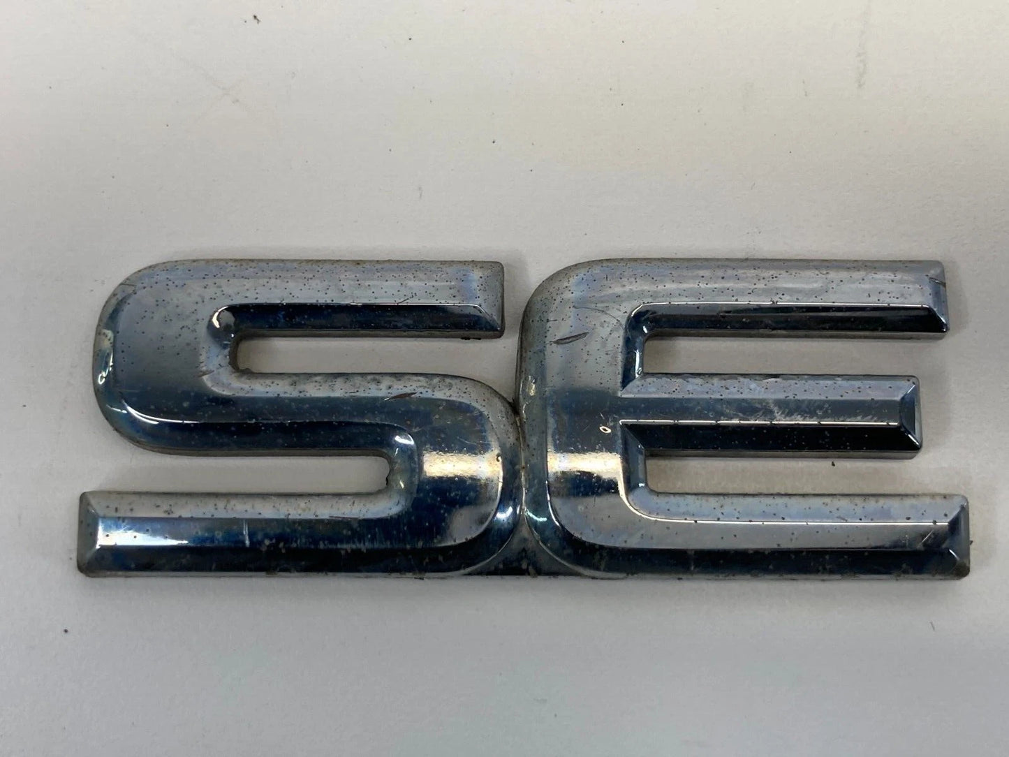 1999-2004 NISSAN PATHFINDER REAR SIDE EMBLEM LOGO BADGE SYMBOL NAMEPLATE SE OEM