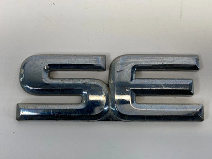 1999-2004 NISSAN PATHFINDER REAR SIDE EMBLEM LOGO BADGE SYMBOL NAMEPLATE SE OEM