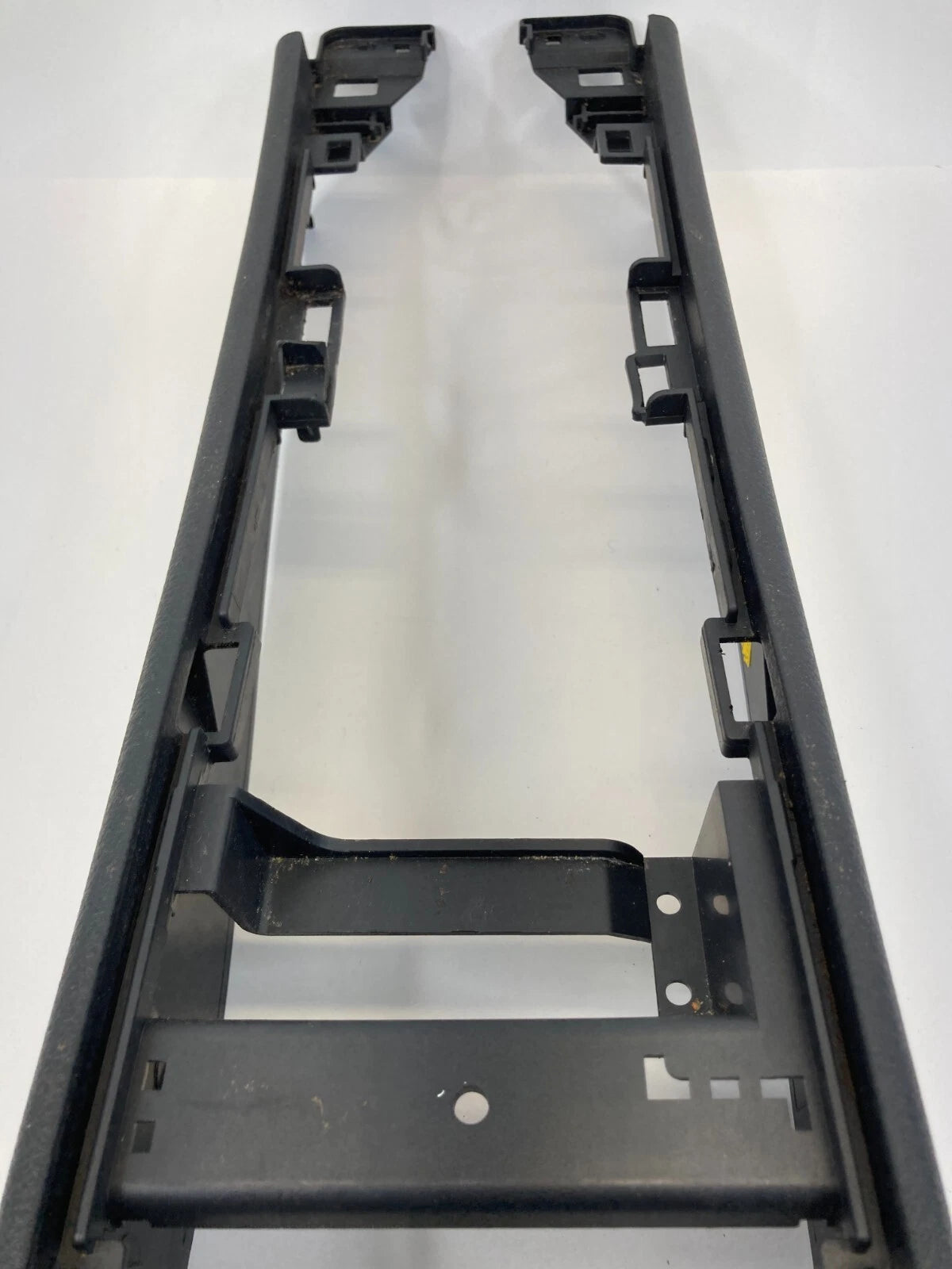 07-12 NISSAN VERSA FRONT FLOOR CENTER CONSOLE BASE BODY FRAME TRIM 96911-EL00A