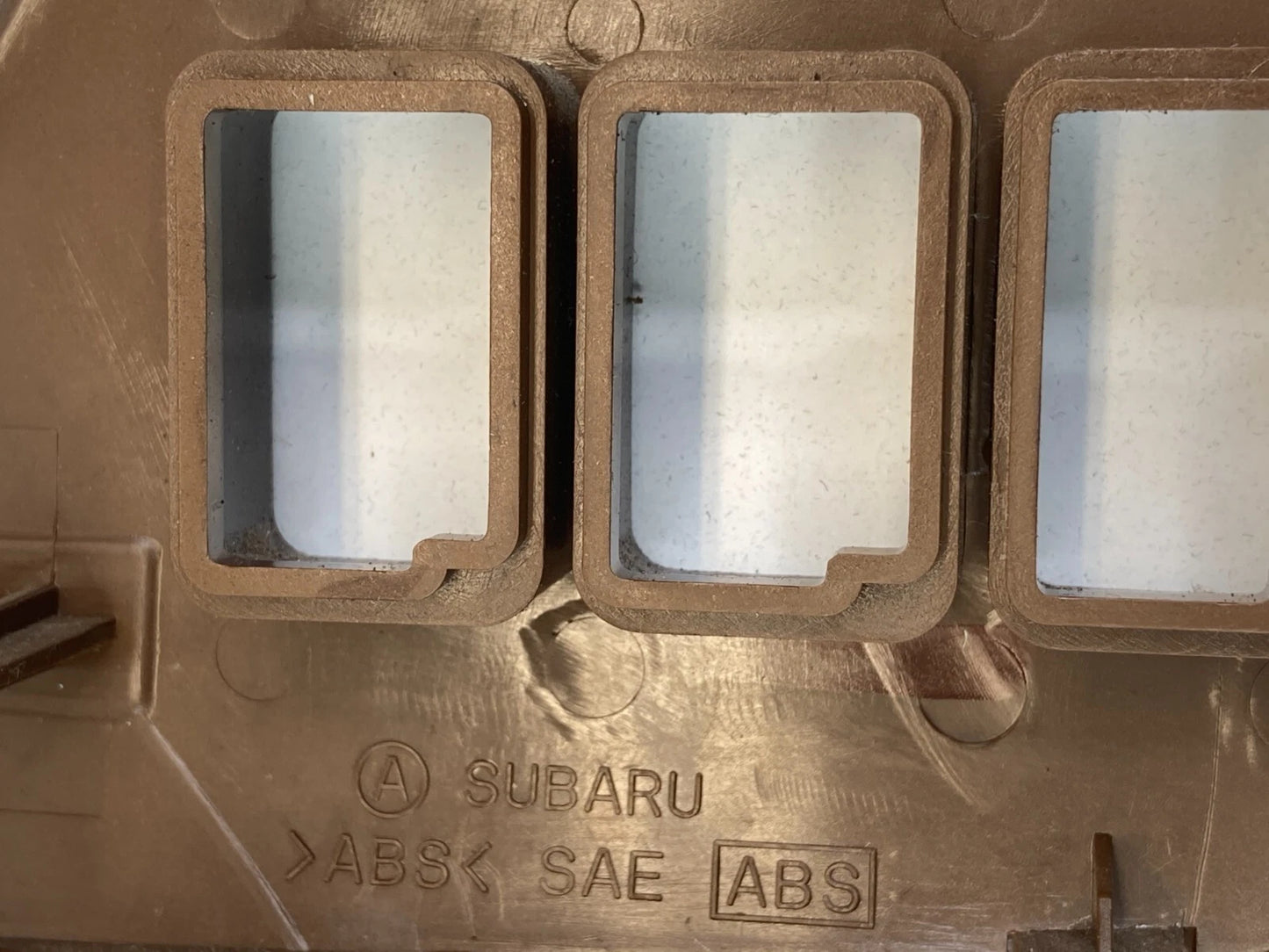 2000-2004 SUBARU OUTBACK LEFT DASH FOG LIGHT CRUISE CONTROL LOWER BEZEL TRIM OEM