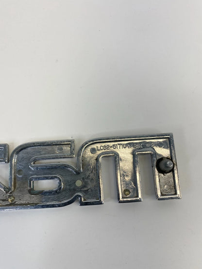 2000-2006 MAZDA MPV REAR TRUNK LID SYMBOL NAMEPLATE BADGE LOGO LC62-51710 OEM