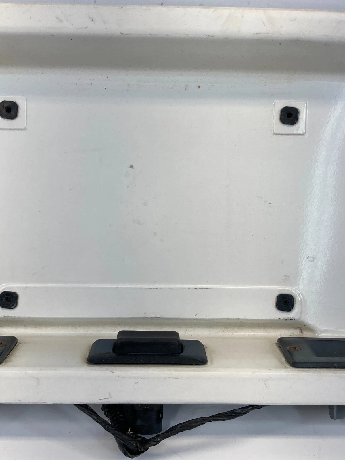 1995-1998 JEEP GRAND CHEROKE REAR TRUNK LICENSE PLATE HOLDER GARNISH MOLDING OEM