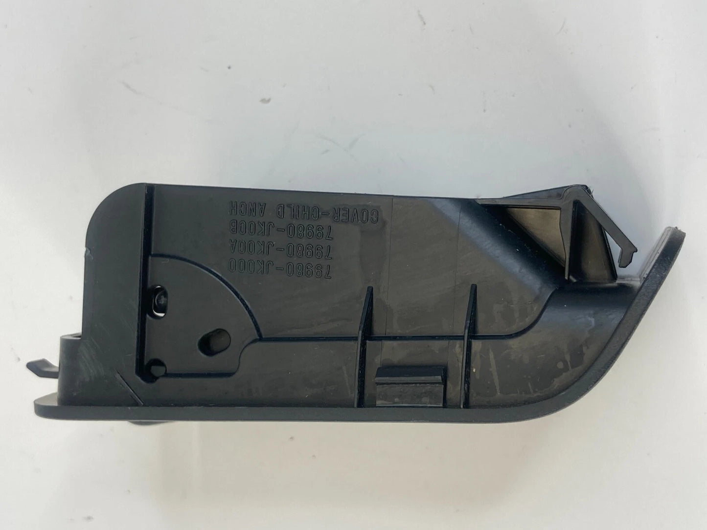 2007 2008 INFINITI G35 SEDAN REAR SEAT CHILD HOOK ANCHOR COVER 79980-JK000 OEM