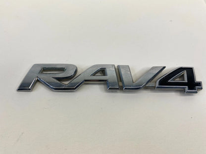 2004-2012 TOYOTA RAV4 REAR BACK DOOR TAILIGATE TAIL GATE EMBLEM NAMEPLATE OEM