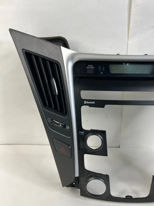 11-14 HYUNDAI SONATA CENTER DASH RADIO CLIMATE CONTROL BEZEL W/ AIR VENT & CLOCK