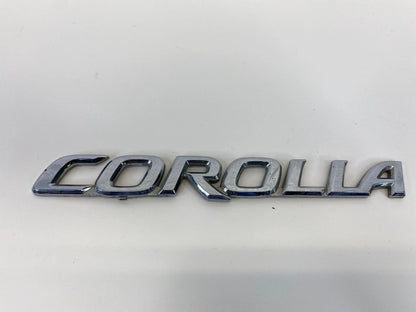 2003-2008 TOYOTA COROLLA REAR TRUNK LID NAMEPLATE EMBLEM BADGE OEM