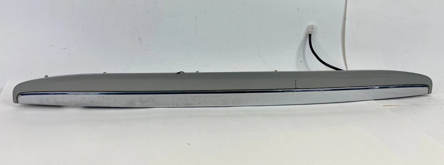2007-2009 LEXUS RX350 LIFGATE LICENSE PLATE BEZEL TRIM MOLDING 76811-0E010 OEM
