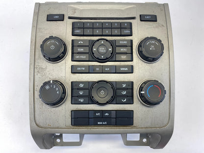 2009-2012 FORD ESCAPE RADIO STEREO AM/FM W/ CLIMATE CONTROL BEZEL 9L8T-19C107-AB