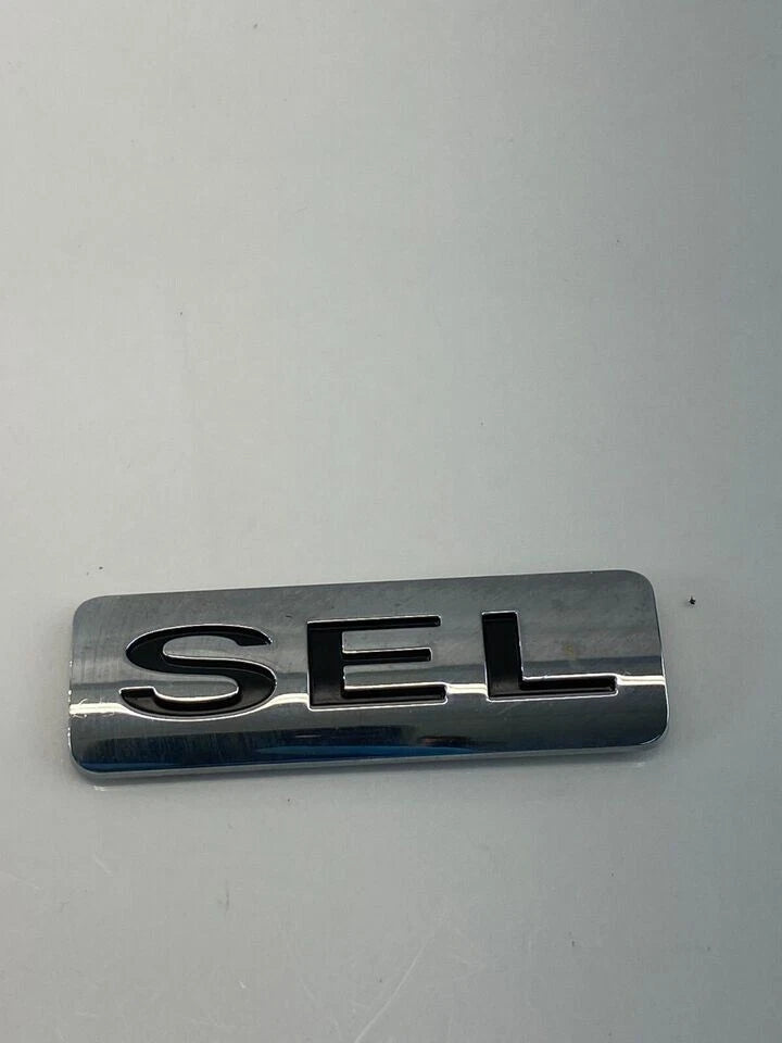 2008-2011 FORD FOCUS SEDAN SEL REAR HATCH TRUNK LID EMBLEM LOGO TRIM OEM