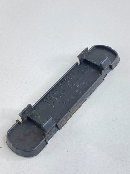 2007-2009 NISSAN SENTRA FRONT LEFT SIDE DOOR PULL HANDLE SCREW COVER 80944-ET000