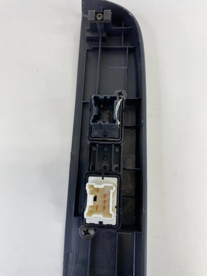 2000-2004 NISSAN XTERRA FRONT RIGHT WINDOW CONTROL SWITCH W/ BEZEL OEM