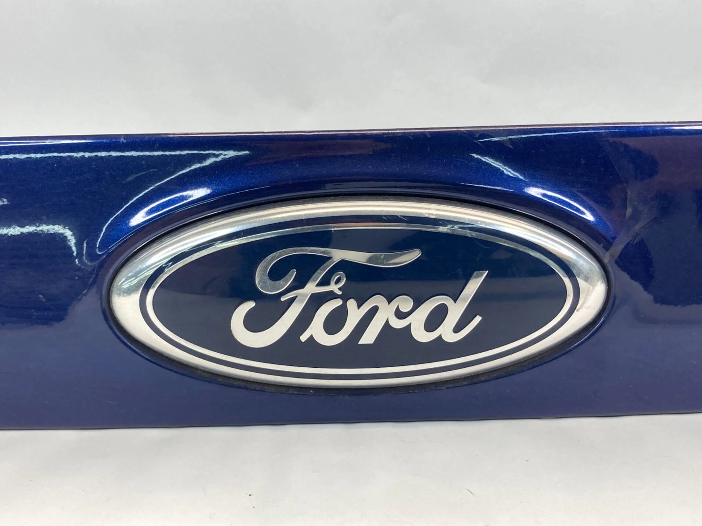 12-14 FORD FOCUS SEDAN REAR TRUNK DECK LID MOLDING FINISH PANEL W EMBLEM BLUE