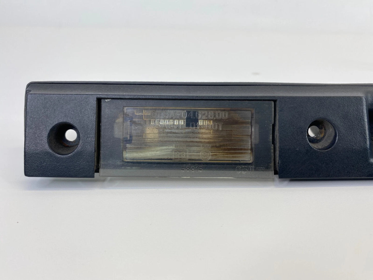 2003-2012 LAND ROVER RANGE ROVER REAR LICENSE PLATE LIGHT MOLDING ASSEMBLY OEM