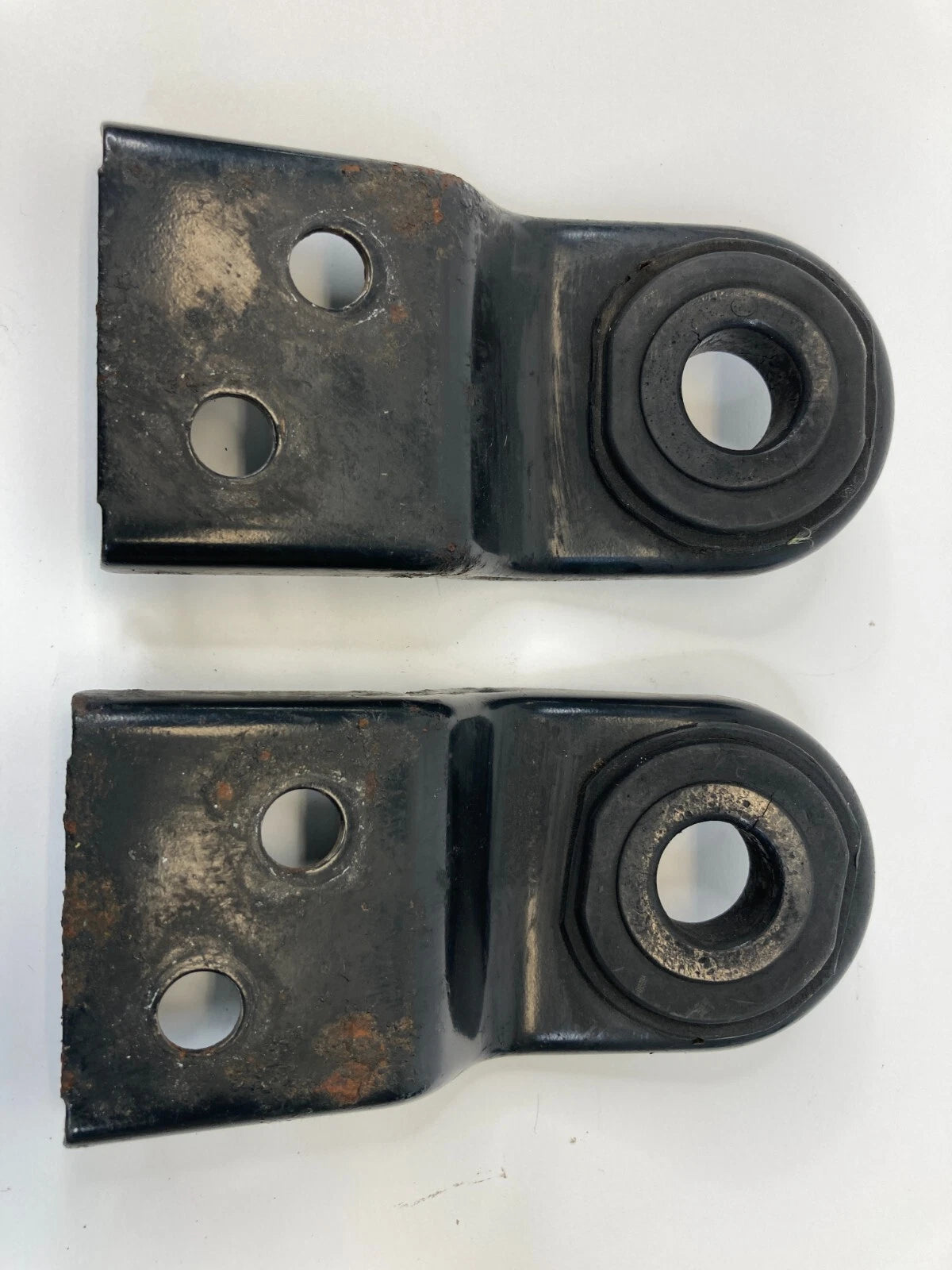 1997-2003 MITSUBISHI MONTERO SPORT RADIATOR BRACKET SUPPORT PAIR SET OEM