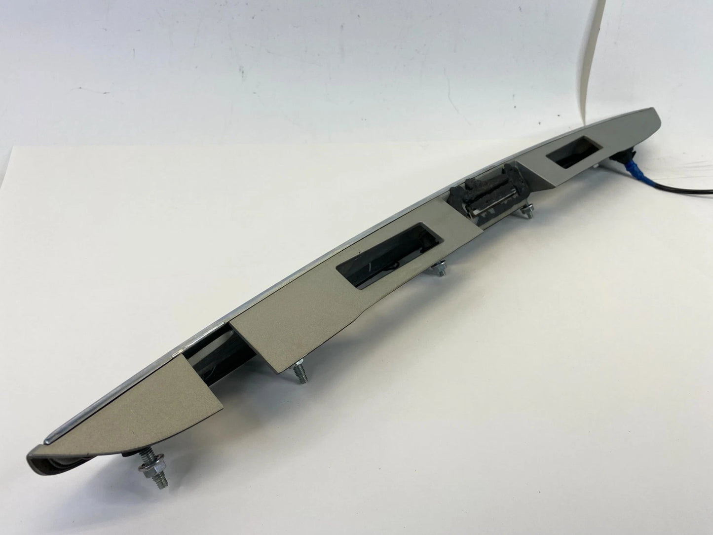 2007-2009 LEXUS RX350 LIFGATE LICENSE PLATE BEZEL TRIM MOLDING 76811-0E010 OEM