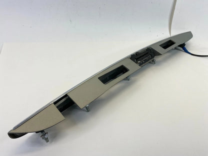 2007-2009 LEXUS RX350 LIFGATE LICENSE PLATE BEZEL TRIM MOLDING 76811-0E010 OEM