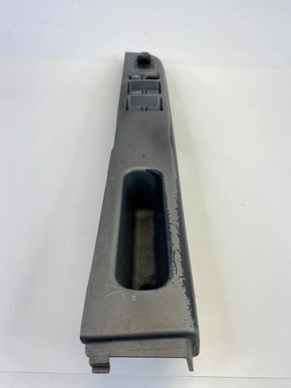 2000-2004 NISSAN XTERRA FRONT LEFT MASTER WINDOW CONTROL SWITCH W/ BEZEL OEM