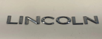 2003-2006 LINCOLN NAVIGATOR REAR TRUNK LID NAMEPLATE LINCOLN EMBLEM LOGO BADGE