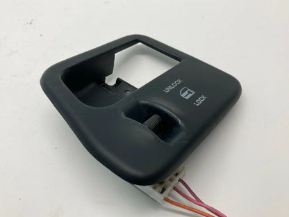 1992-1995 DODGE CARAVAN FRONT RIGHT SIDE DOOR HANDLE BEZEL W/ LOCK SWITCH OEM