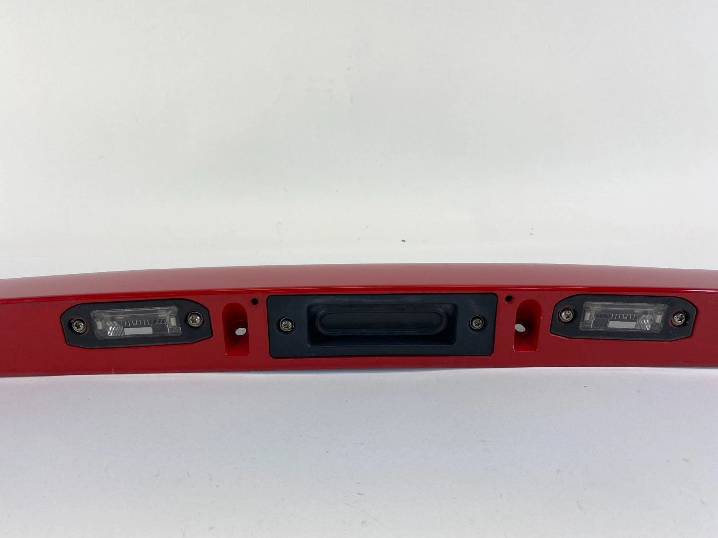 2004-2008 VOLVO S40 TRUNK LID LICENSE PLATE HANDLE MOLDING COVER 39880383 RED