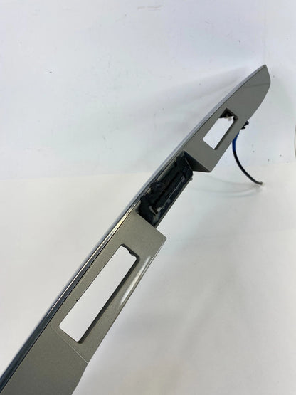 2007-2009 LEXUS RX350 LIFGATE LICENSE PLATE BEZEL TRIM MOLDING 76811-0E010 OEM