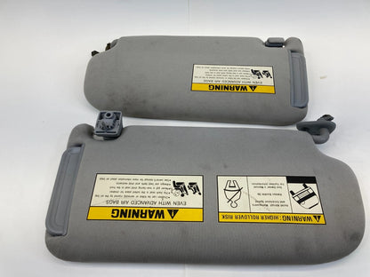 06-09 HYUNDAI TUCSON DRIVER & PASSENGER SUNVISOR SUN VISOR PAIR SET TRIM OEM