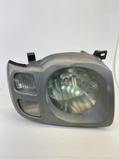 2002-2004 Nissan Xterra FRONT RIGHT PASSENGER SIDE HEADLIGHT HEADLAMP OEM