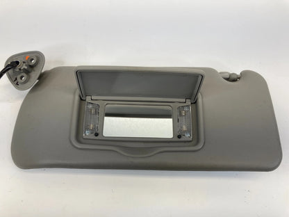 2004-2009 CADILLAC SRX ROOF LEFT SUNVISOR SUN VISOR SHADE W/ LAMPS ASSEMBLY OEM