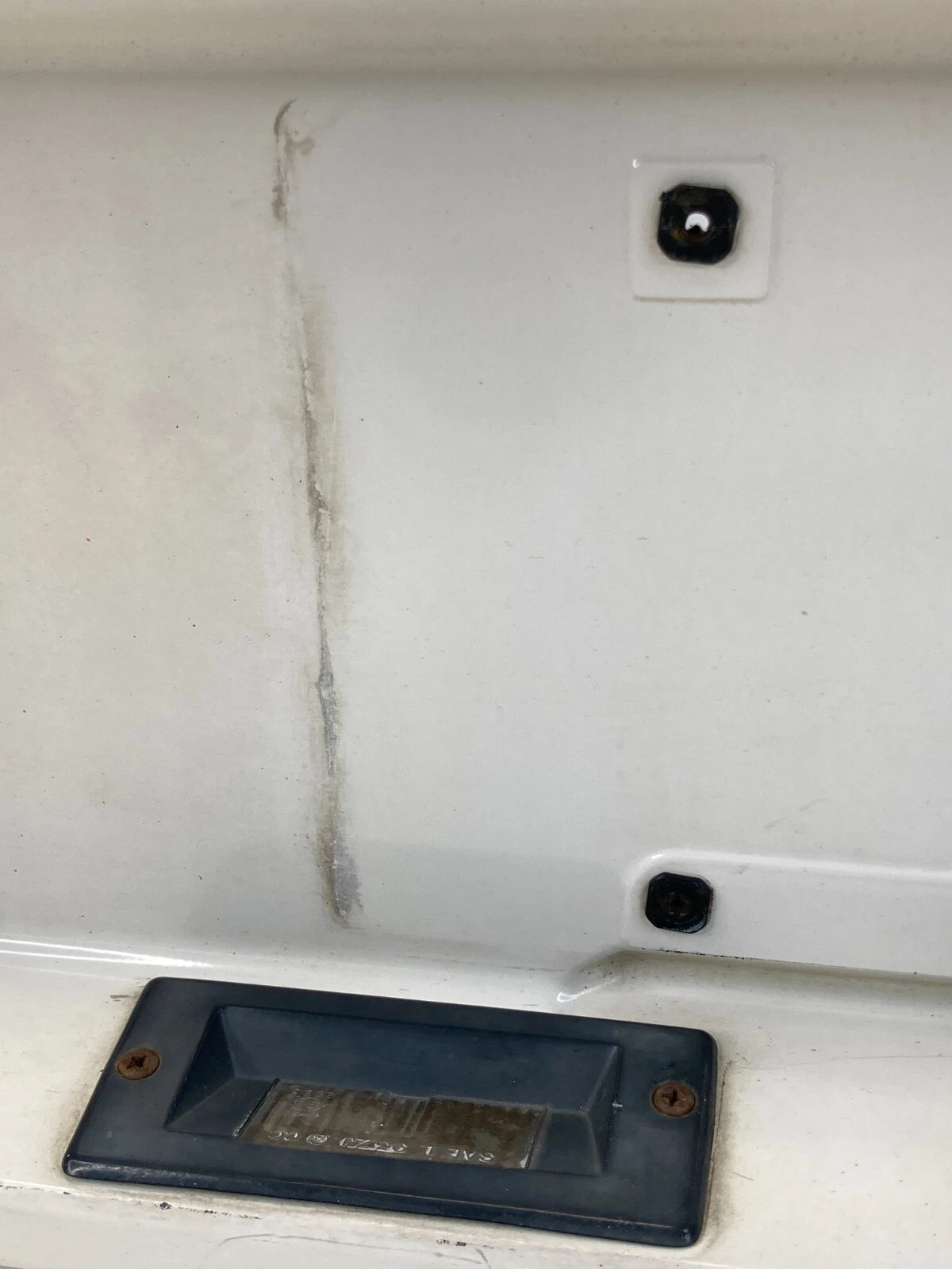 1995-1998 JEEP GRAND CHEROKE REAR TRUNK LICENSE PLATE HOLDER GARNISH MOLDING OEM