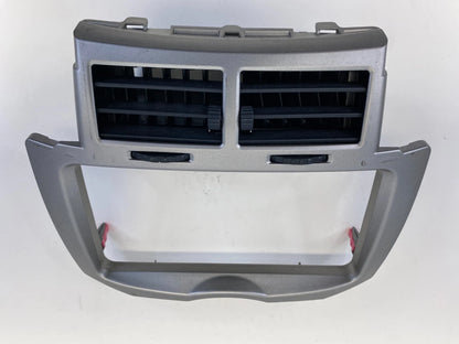 2008-2011 TOYOTA YARIS CENTER DASH AC AIR VENT & RADIO BEZEL TRIM 5540552580 OEM