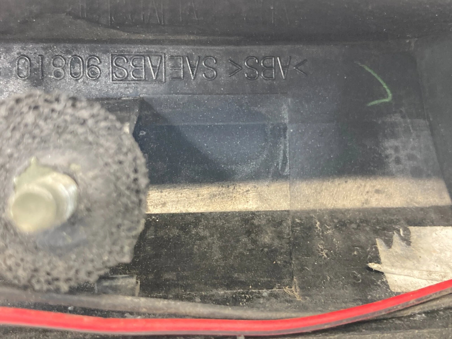 2000-2004 NISSAN PATHFINDER RR LIFTGATE LID LICENSE MOLDING GARNISH W/EMBLEM OEM