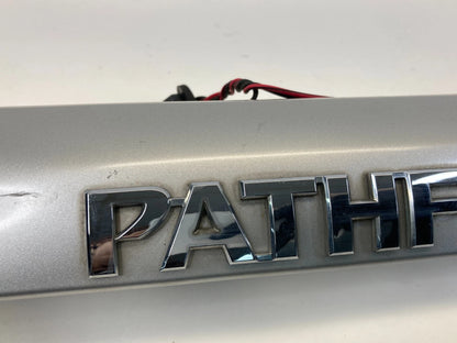 2000-2004 NISSAN PATHFINDER RR LIFTGATE LID LICENSE MOLDING GARNISH W/EMBLEM OEM