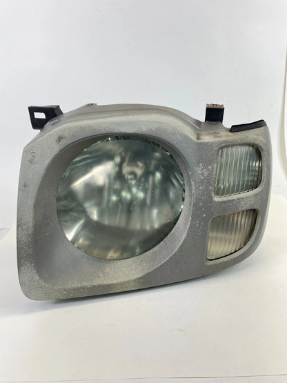 2002-2004 Nissan Xterra FRONT LEFT DRIVER SIDE HEADLIGHT HEADLAMP OEM