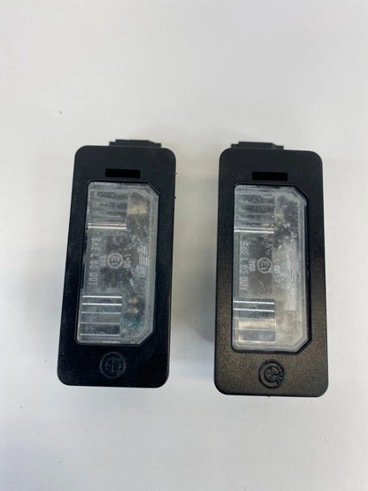 2006 BMW 330XI SEDAN REAR TRUNK LID LICENSE PLATE LIGHT LAMP SET PAIR OEM