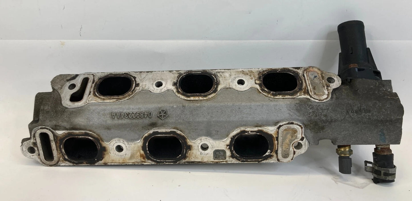 2009 2010 CHRYSLER TOWN & COUNTRY ENGINE LOWER INTAKE MANIFOLD 04892234AA OEM