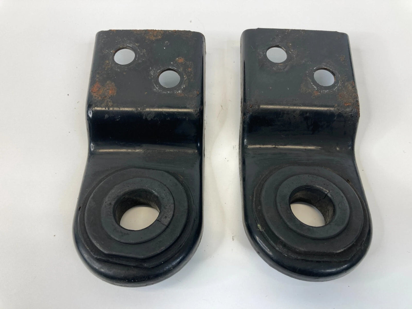 1997-2003 MITSUBISHI MONTERO SPORT RADIATOR BRACKET SUPPORT PAIR SET OEM