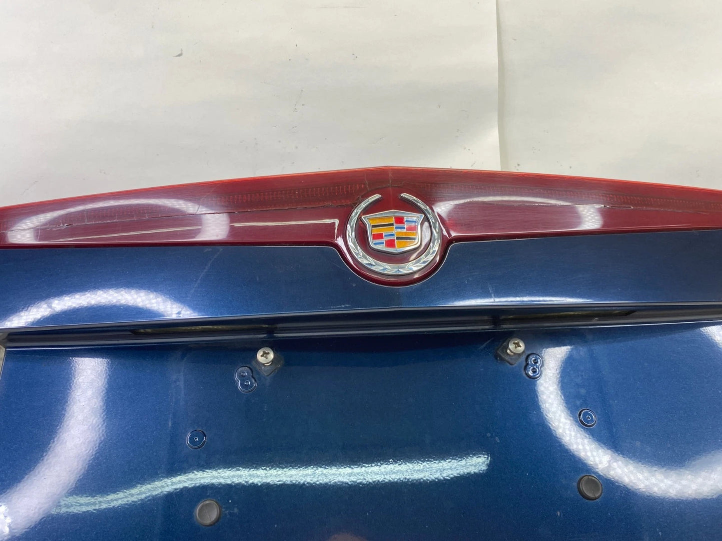 2003-2007 CADILLAC CTS TRUNK PANEL LID TAIL PLATE BEZEL W/ THIRD BRAKE LIGHT OEM