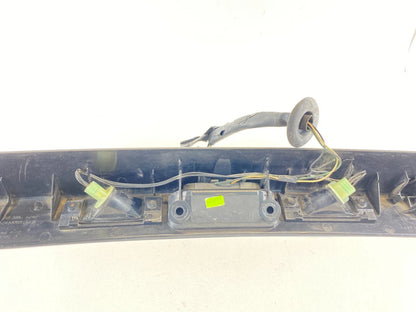 01-05 DODGE GRAND CARAVAN REAR LICENSE PLATE LIGHT FILLER MOULDING 04857231AE