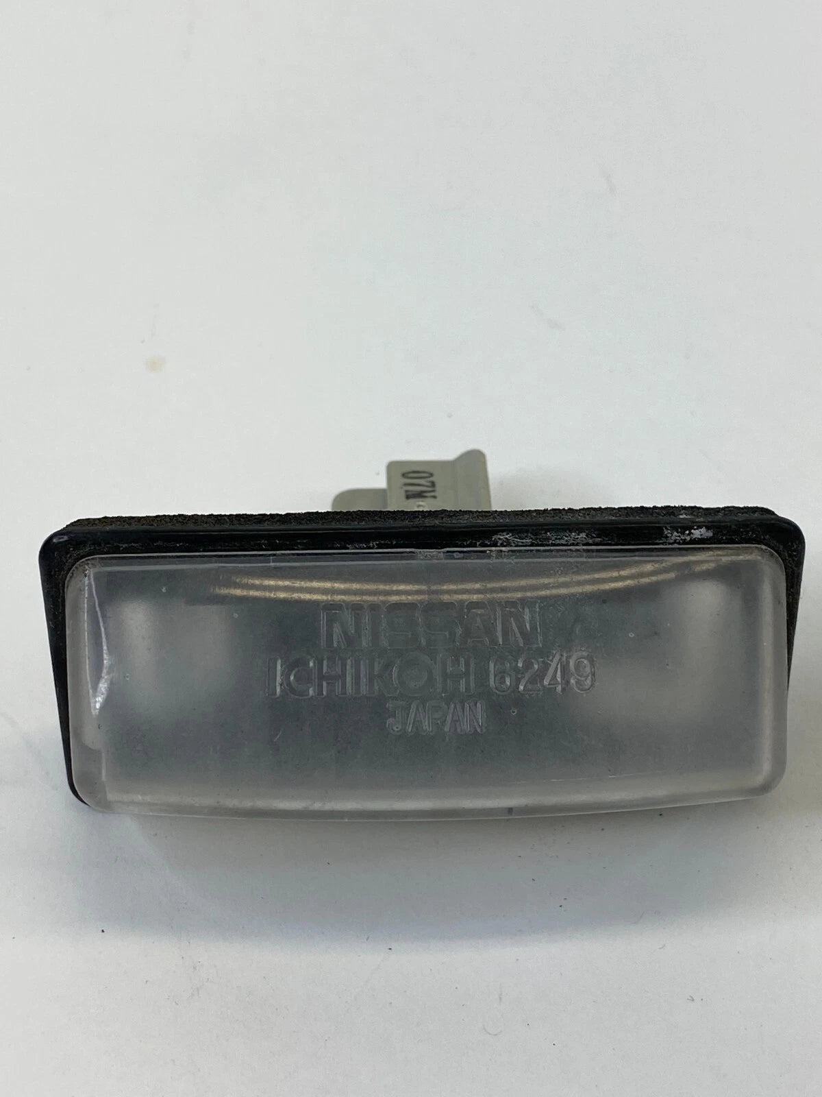 2008-2013 NISSAN ROGUE REAR TRUNK LICENSE PLATE LIGHT LAMP ASSEMBLY I090037 OEM