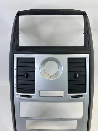 08-10 CHRYSLER TOWN & COUNTRY CENTER DASH RADIO BEZEL TRIM PANEL 1DR16TRMAB OEM