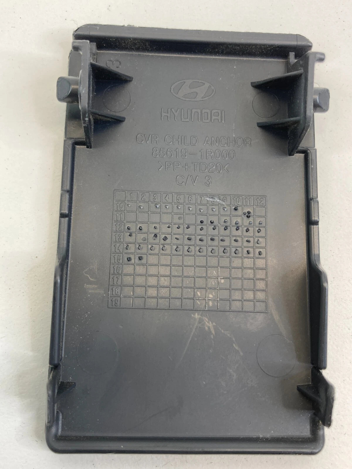 2012-2017 HYUNDAI ACCENT REAR SEAT CHILD RESTRAINT ANCHOR COVER TRIM 85619-1R000
