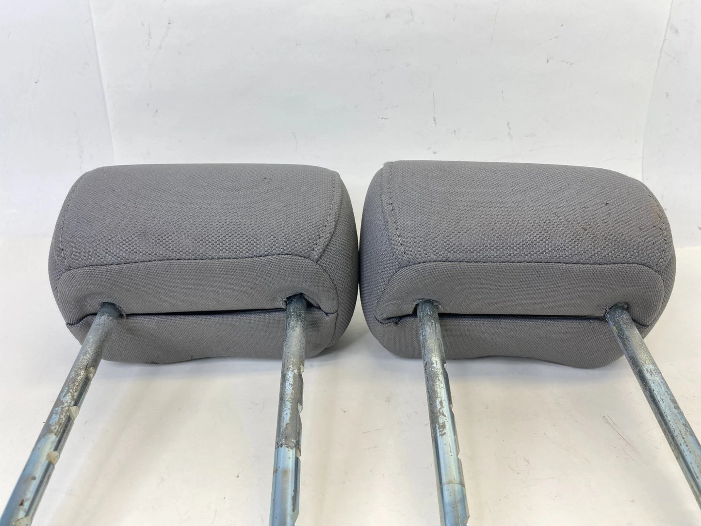 04 05 FORD F-150 REAR CLOTH LEFT & RIGHT SEAT HEADREST HEAD REST SET FLINT OEM