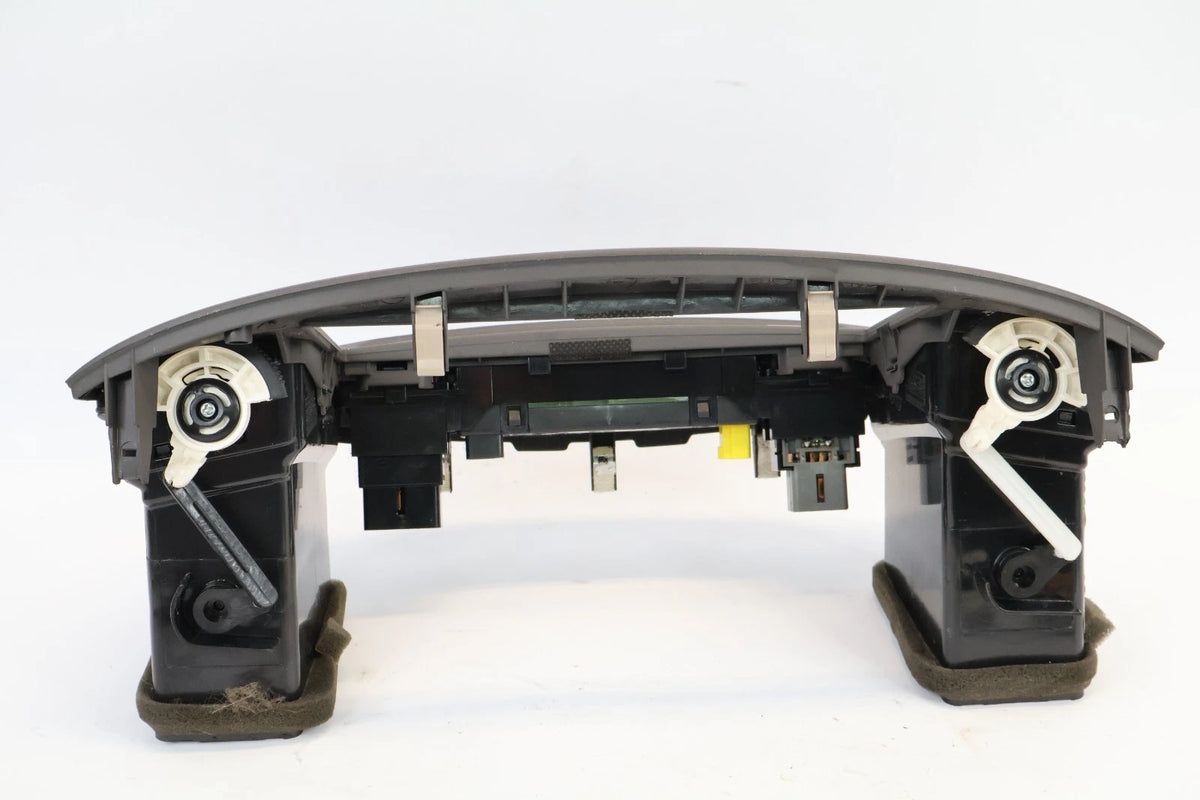 06-11 HYUNDAI ACCENT CENTER DASH RADIO CLIMATE BEZEL PANEL W VENTS & CLOCK OEM