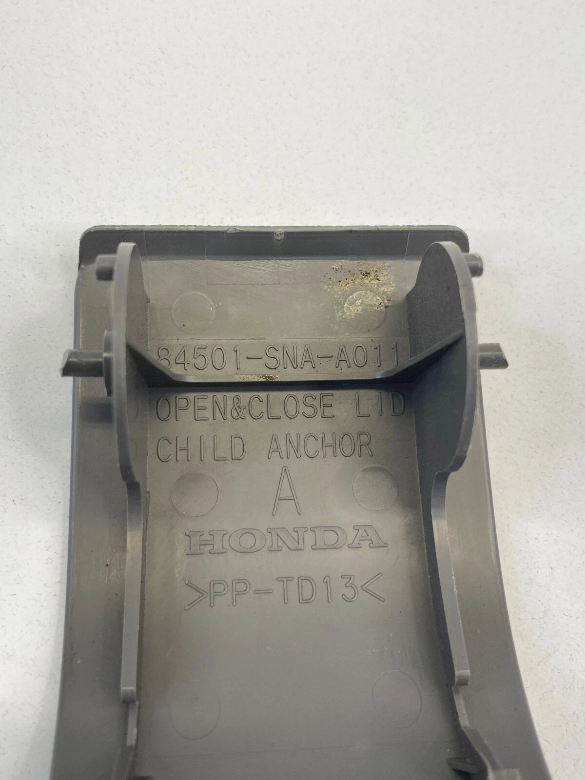 2006-2011 HONDA CIVIC DECK LID CHILD SEAT RESTRAINT ANCHOR COVER 884501-SNA-A01
