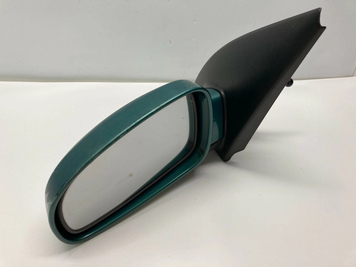 2004 2005 CHEVROLET AVEO FRONT LEFT DRIVER SIDE VIEW MANUAL DOOR MIRROR E1101575